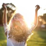 Girl enjoying a morning sunlight