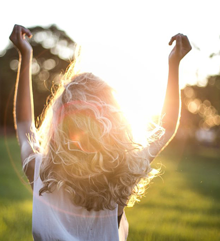 Girl enjoying a morning sunlight
