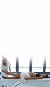 An expectant mother relaxing during a foot massage during pregnancy at Spa Mariana.